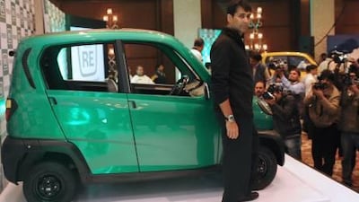 Rajiv Bajaj, the managing director of Bajaj Auto, at the launch of the RE60, an ultra-low-cost car, in January last year. Sajjad Hussain / AFP