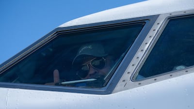 A pilot gives a thumbs-up from the cockpit of an Avelo Airlines jet. Bloomberg