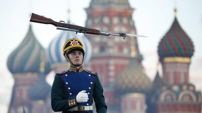 A member of the Band of the Moscow Suvorov Military Music College from Russia performs during the dress rehearsal of the International Military Music Festival “Spasskaya Tower” in front of the St. Basil’s Cathedral in Red Square in Moscow. Maxim Zmeyev / Reuters
