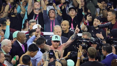 Canelo Alvarez celebrates his victory over Jaime Munguia. AFP