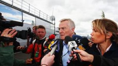 Max Mosley, the FIA president, is beseiged by the media as he arrives in the paddock during practice for the British Formula One Grand Prix at Silverstone, on June 19 2009 in Northampton, England.