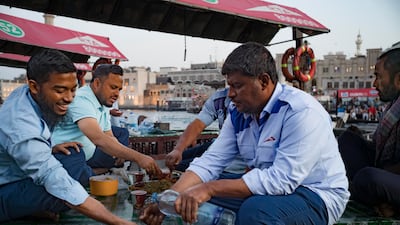 Some captains gather in small groups to break their fast together.