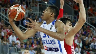 Greece's Giannis Antetokounmpo of the Milwaukee Bucks goes up for a lay-up against Croatia's Dario Sarica during EuroBasket 2015 on Sunday. Antonio Bat / EPA