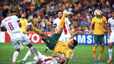 Australia's Tim Cahill, centre, scores during the AFC Asian Cup 2015 quarter-final match between China and Australia in Brisbane. EPA/DAVE HUNT
