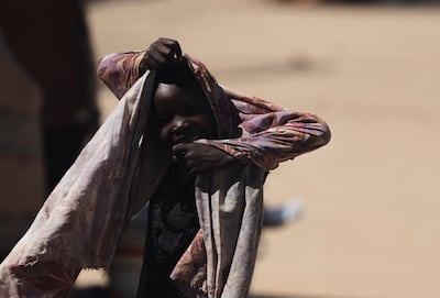 A Sudanese child at Tine transit refugee camp in eastern Chad. The war has created one of the world's worst humanitarian disasters. Reuters