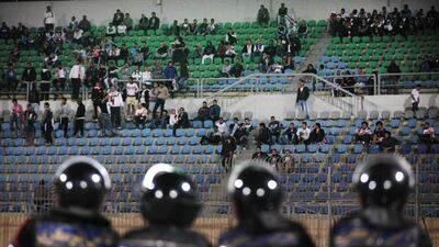 Egyptians watch a match between Egyptian Premier League clubs Zamalek and ENPPI at the Air Defense Stadium in a suburb east of Cairo, Egypt. Ahmed Abd El-Gwad, El Shorouk Newspaper / AP