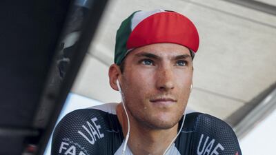 Sven Bystrom warms up on his bike ahead of a day of racing.