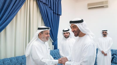 Sheikh Mohamed bin Zayed, Crown Prince of Abu Dhabi and Deputy Supreme Commander of the Armed Forces, visits the home of his former teacher, Ahmed Al Tamimi, left, at Khalifa City. All photos by Mohammed Al Hammadi / Crown Prince Court - Abu Dhabi