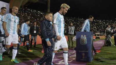 Argentina's Lionel Messi enters the field. Juan Mambromata / AFP