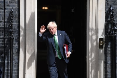 British Prime Minister Boris Johnson departs 10 Downing Street for Prime Minister's Questions on July 13, 2022, where he hinted that this may be his last such appearance at the ballot box. EPA