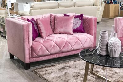 A pink velvet sofa at The Home is in line with one of 2017’s key decor trends. Antonie Robertson / The National
