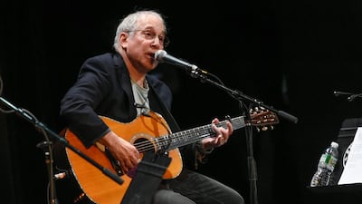 Paul Simon performs at the Country Music Hall of Fame benefit concert in New York. Simon’s latest album, Stranger to Stranger, was released on June 3. Photo by Evan Agostini / Invision / AP