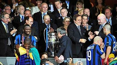 Jose Mourinho, the Inter coach, makes his way through the line of dignitaries at the Bernabeu.