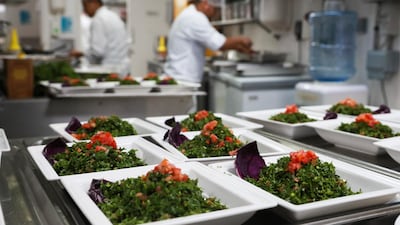 A traditional Lebanese spread has a generous number of hot and cold side dishes. The cold salad Tabbouleh is a perennial favourite. Victor Besa / The National