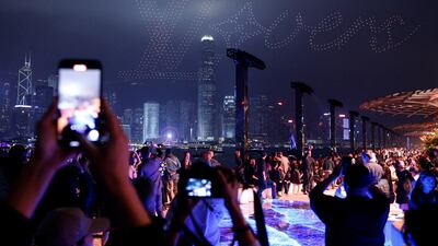 Drones lit up the sky to spell the word 'Lovers', with the LV logo on full display. Reuters