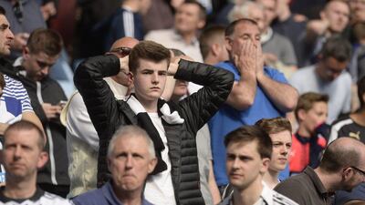 Newcastle fans look dejected. Reuters / Philip Brown