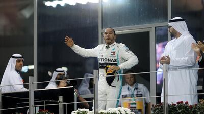 Lewis Hamilton celebrates after the race. Reuters