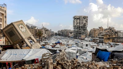 A makeshift displacement camp surrounded by rubble in Gaza city shows the living conditions for many Palestinians in the territory. AFP