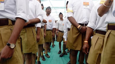 Volunteers from Indian right-wing organisation Rashtriya Swayamsevak Sangh (RSS) queue as they arrive for a rally in Pune, some 135km south-east of Mumbai, on January 3, 2016. Indranil Mukherjee/AFP Photo