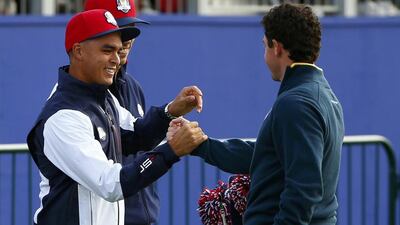 Rickie Fowler. left, of the US and Rory McIlroy, right, of Europe greet each other on Tuesday ahed of the 2014 Ryder Cup at Gleneagles in Scotland, starting Friday. Eddie Keogh / Reuters / September 23, 2014