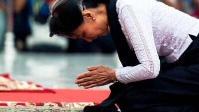 Myanmar State Counsellor Aung San Suu Kyi pays respects to her late father at a ceremony marking the 71st anniversary of Martyrs' Day in Yangon, in July 2018. AFP