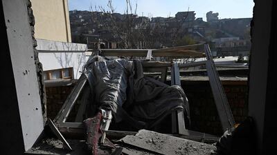 A damaged house is seen after several rockets land at Khair Khana, north west of Kabul. A series of loud explosions shook central Kabul on November 21, including several rockets that landed near the heavily fortified Green Zone where many embassies and international firms are based, officials said. AFP