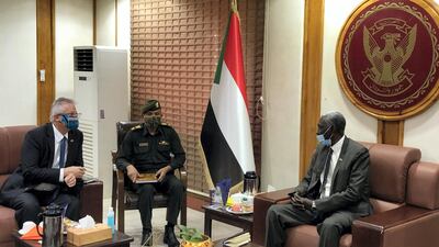 Andrew Young, deputy to the US Africa Command commander for Civil-Military Engagement meets with Minister of Defence Maj Gen Yassin Ibrahim Yassin. Africom