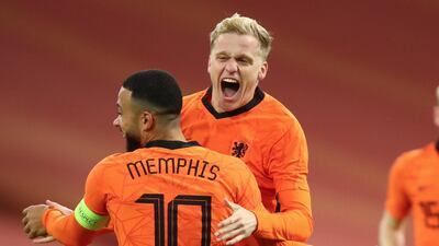 Donny van de Beek celebrates with Memphis Depay after scoring the equaliser for the Netherlands against Spain during the international friendly at the Johan Cruyff ArenA in Amsterdam. AP