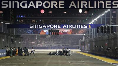 Singapore Grand Prix, September 21. An emphatic win for Hamilton, from pole, while Rosberg retired with steering wheel problems on lap 14 after being forced to start from the pit lane. Points: Hamilton 241, Rosberg 238. (Photo: Xavier Galiana / Reuters