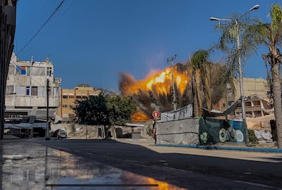 An explosion following an Israeli air strike in Gaza City on Sunday. EPA