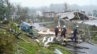 Destroyed houses, cars and power poles, which according to local media were believed to be caused by a tornado, are seen as Typhoon Hagibis approaches the Tokyo area in Ichihara, east of Tokyo, Japan. Reuters