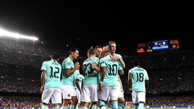 Martinez celebrates with team mates after he scores his sides first goal. Getty Images