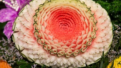 A carved watermelon is displayed during a fruit and vegetable carving competition in Bangkok. Robert Schmidt / AFP