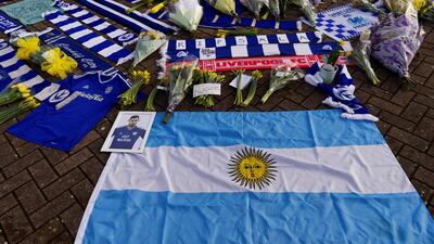 Tributes are left outside the stadium. Reuters