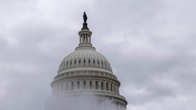 Steam rises from a grate near the US Capitol. Getty Images via AFP