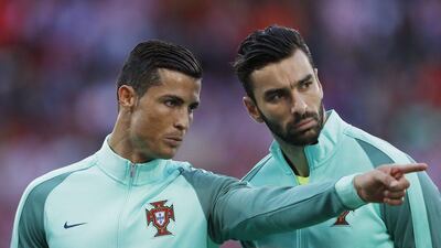 Cristiano Ronaldo and Rui Patricio line up for the national anthems before the game. Lee Smith / Reuters