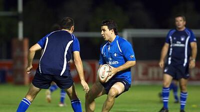 The UAE sevens squad train at the Rugby Sevens stadium in Dubai. Their bid to play in December's tournament there is contingent on the cricket board's approval.