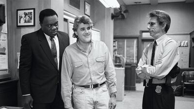 Yaphet Kotto, pictured alongside Jay Leno and Richard Belzer, on the set of gritty police drama 'Homicide: Life on the Street' in 1995. As Lt Al Giardello, Kotto featured in 122 episodes over seven seasons. Getty Images