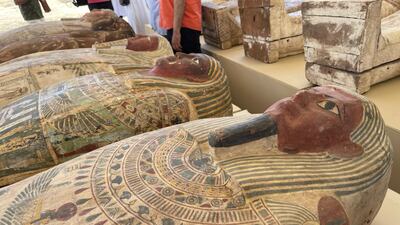 Some of the discoveries, including 35 painted wooden sarcophagi, put on display at the Unesco heritage site south of Cairo. Mahmoud Nasr / The National