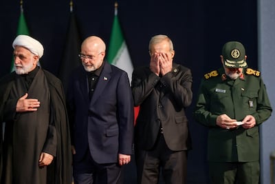 From left, Iran's chief justice Gholam-Hossein Mohseni-Ejei, Parliament Speaker Mohammad Bagher Ghalibaf, President Masoud Pezeshkian and military commander Mohsen Rezaee attend the farewell ceremony. Reuters
