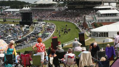 Horses complete the Qatar Bloodstock Richmond Stakes race on Ladies Day at Goodwood Races on July 31, 2014. Dan Kitwood / Getty Images