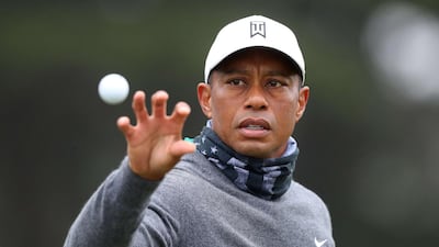 Tiger Woods catches a ball during a practice round prior to the 2020 PGA Championship at TPC Harding Park. AFP