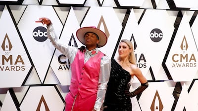 Singer Jimmie Allen, left, with dancer Emma Slater. Reuters