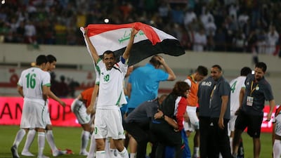 Younus Khalaf (No 10) and his Iraq teammates celebrate a 3-1 victory in the only qualifying game of consequence for the Asian Cup 2015 in Sharjah on Wednesday, March 5, 2014. Pawan Singh / The National