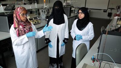 From left, Salma Abubaker, Zaineb Saeed and Shefaa Abou Namous are three of the four United Arab Emirates University students working in Al Ain to develop a portable device to detect heavy metals and other pollutants in water. Delores Johnson / The National