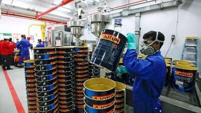 Inspectors from the Abu Dhabi Environment Agency carry out a routine environmental check at a Jotun paint manufacturing factory in Abu Dhabi. Sarah Dea / The National