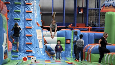 Harriet Osgerby, centre, on the trampolines. Pawan Singh / The National