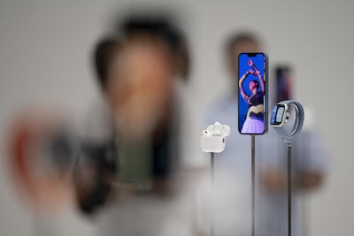 Apple aims to attract new customers through its new products. Bloomberg