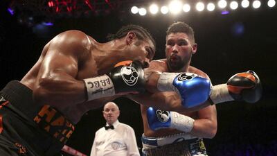 Tony Bellew, right, won the first contest against an injured David Haye in March 2017. Nick Potts / PA