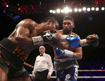 Tony Bellew, right, won the first contest against an injured David Haye in March 2017. Nick Potts / PA